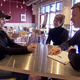 Monty Moran, interviewing a Chipotle employee